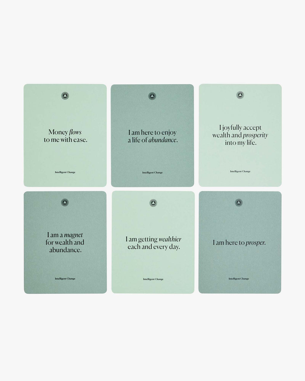 Six example financial abundance affirmation cards laid out together.
