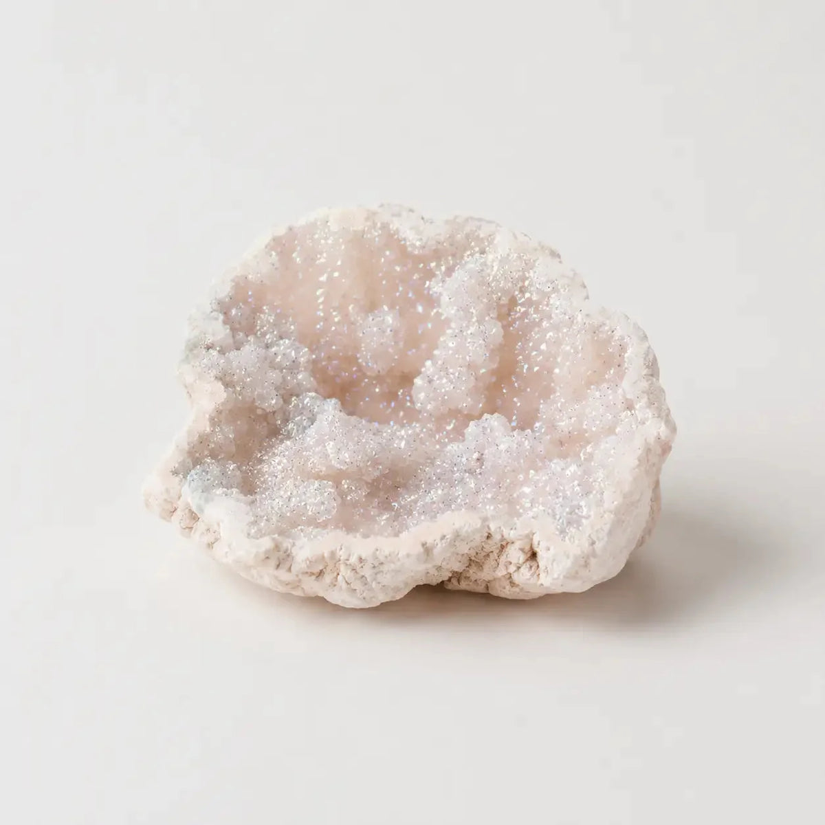 LumaStone white electroplated hollow agate crystal with sparkling freeform druzy interior, ideal crystal decor.