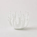 StillAura glass lotus candle holder; an elegant clear glass candlestick home fragrance accessory.