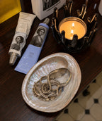 StillAura Glass Lotus Candle Holder: elegant clear glass candlestick, a beautiful home fragrance accessory.
