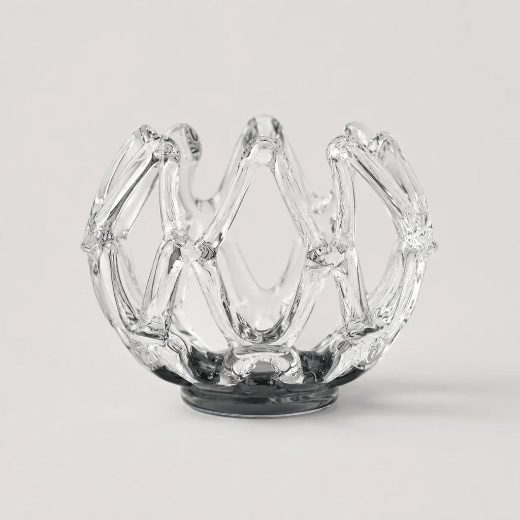 StillAura glass lotus candle holder; elegant home fragrance accessory, perfect for candles.