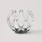 StillAura glass lotus candle holder; elegant home fragrance accessory, perfect for candles.