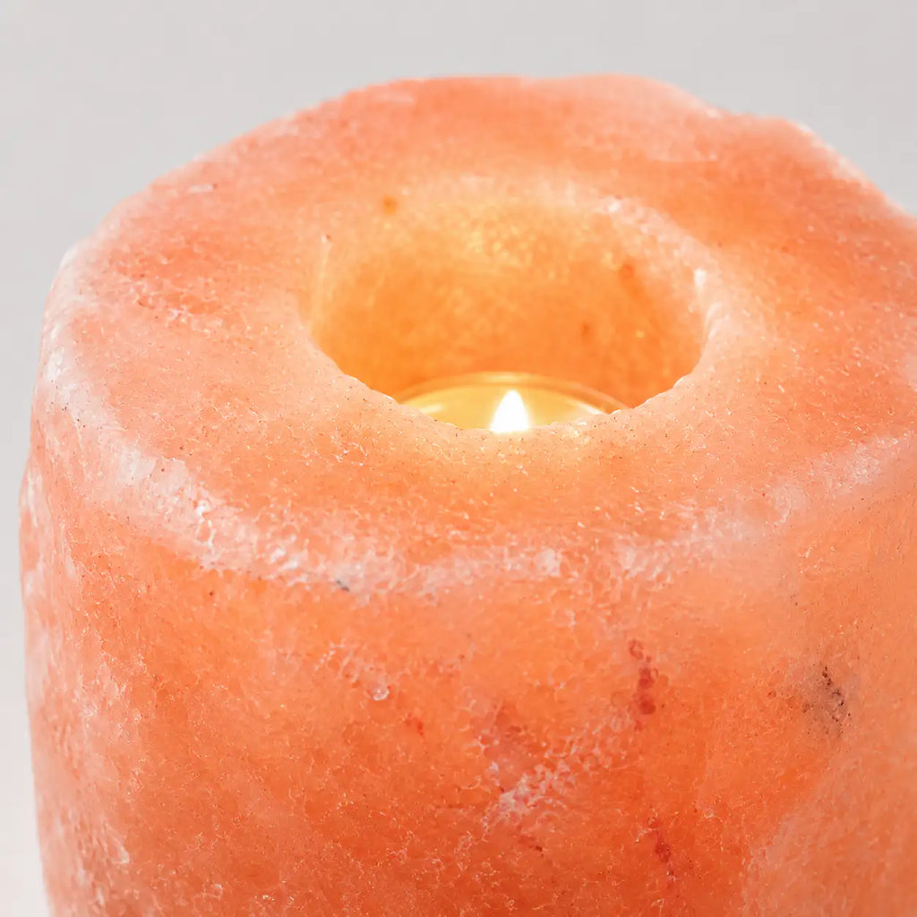 LumaStone rose mineral salt crystal healing candle holder with a glowing tea light, perfect decorative home decor.