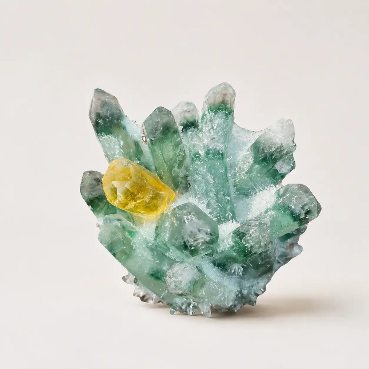 LumaStone polished green ghost crystal cluster, a natural energy stone and elegant geometric decor ornament.