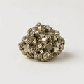 LumaStone raw natural pyrite stone ornament, a sparkling metallic gold crystal raw stone decorative object.