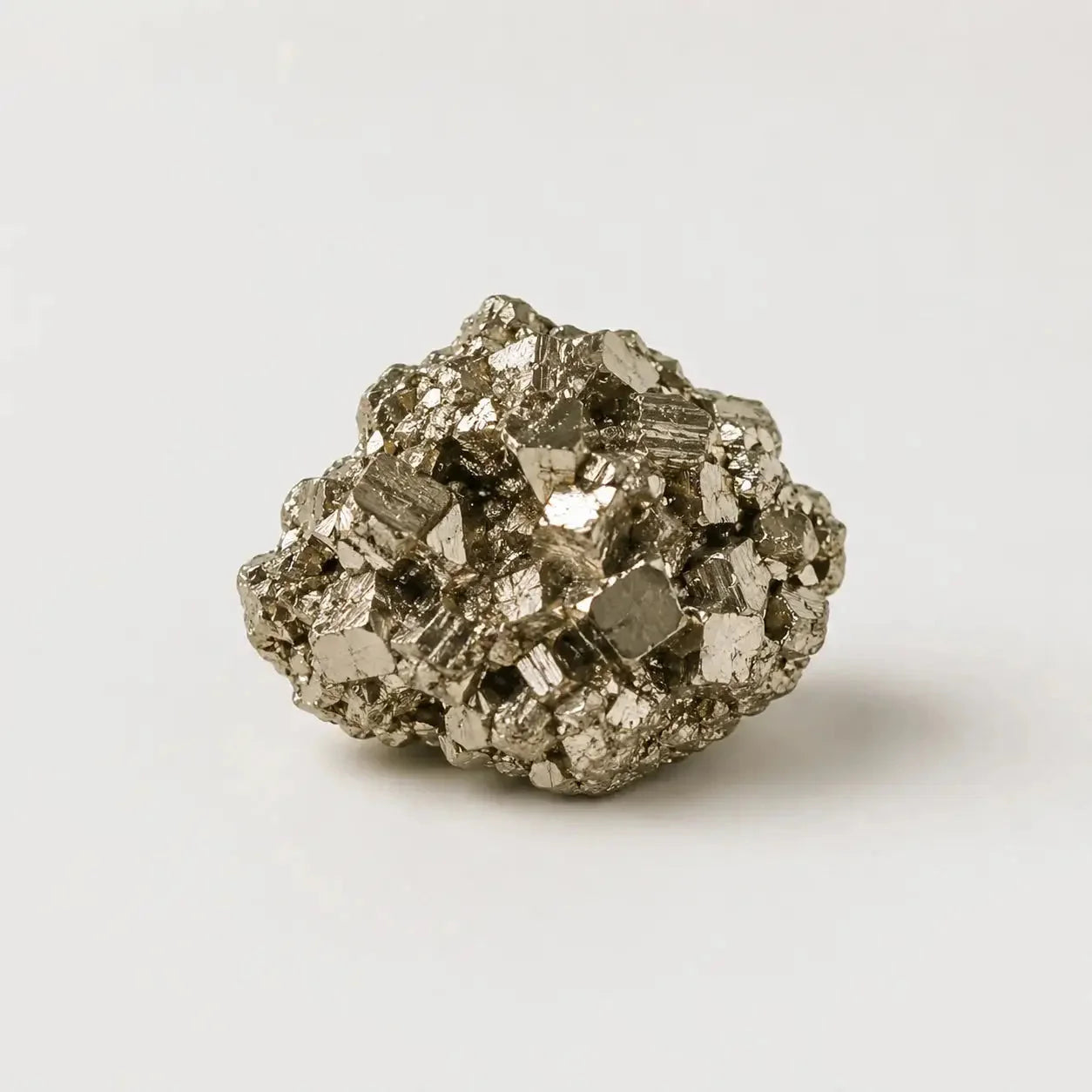 LumaStone raw natural pyrite stone ornament, a sparkling metallic gold crystal raw stone decorative object.