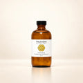 Paavani Ayurveda castor oil in an amber glass bottle