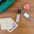 Women’s Moon Oil bottle in a styled flat lay