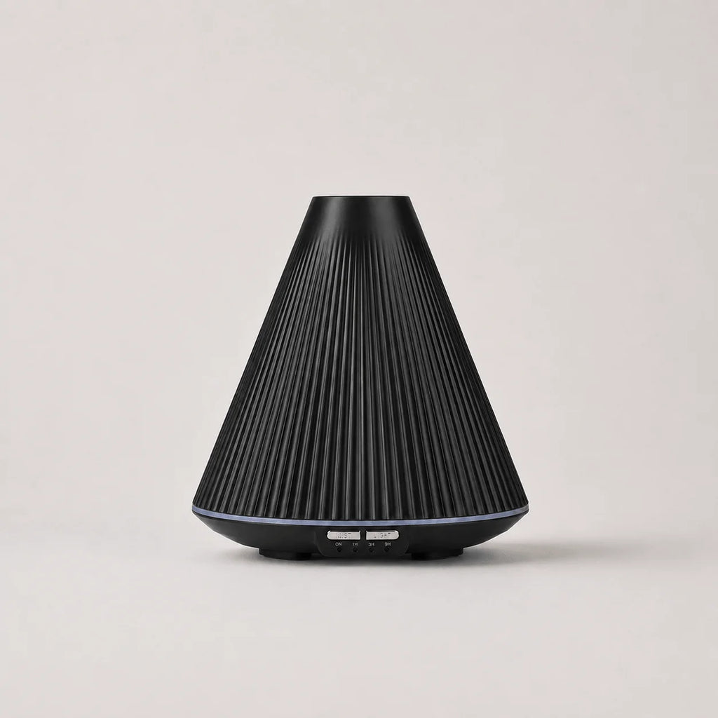 StillAura 160 ml aromatherapy humidifier diffusing a calming mist, perfect for home fragrance.