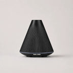 StillAura 160 ml aromatherapy humidifier diffusing a calming mist, perfect for home fragrance.