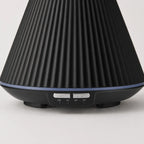 StillAura 160ml aromatherapy humidifier, a sleek fragrance diffuser for soothing home ambiance.