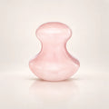 Rose quartz facial massage tool shown alone
