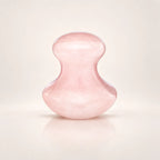Rose quartz facial massage tool shown alone