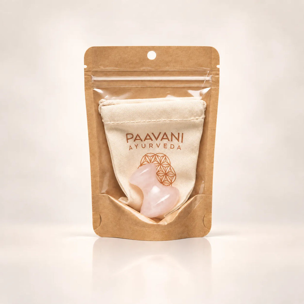 Rose quartz facial massage tool with included cloth drawstring pouch