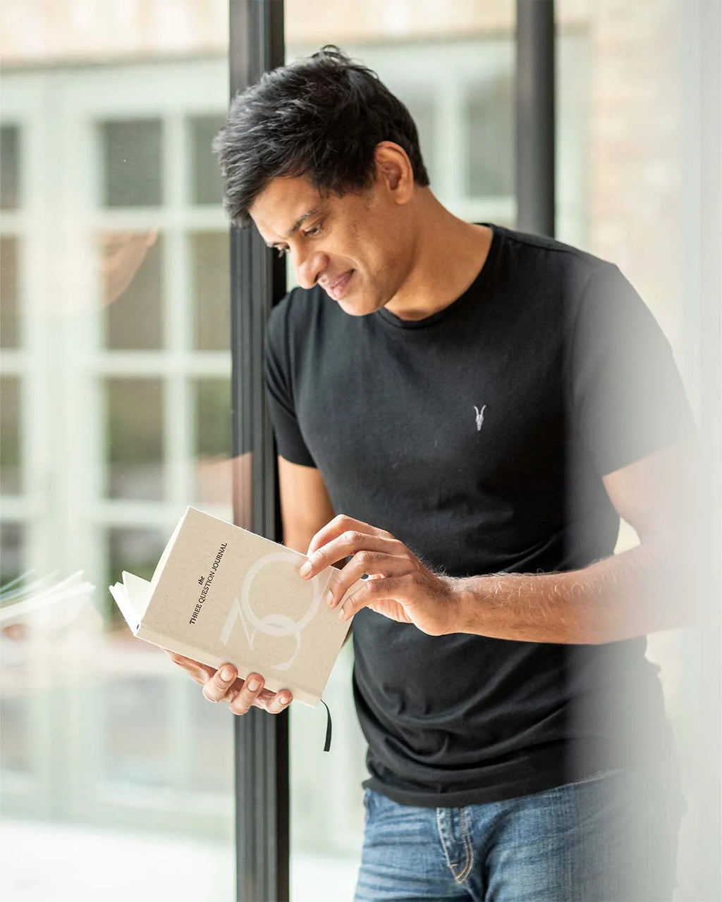 Dr. Rangan Chatterjee with The Three Question Journal