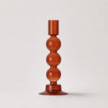 StillAura borosilicate glass candle holder, elegant transparent glass candlestick for home decor.