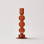 StillAura borosilicate glass candle holder, elegant transparent glass candlestick for home decor.