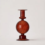 StillAura borosilicate glass candle holder, clear decorative candlestick for home decor, side angle view.