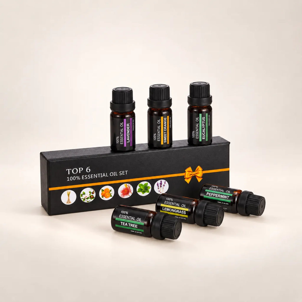 Six StillAura aromatherapy oil bottles arranged around their presentation box.
