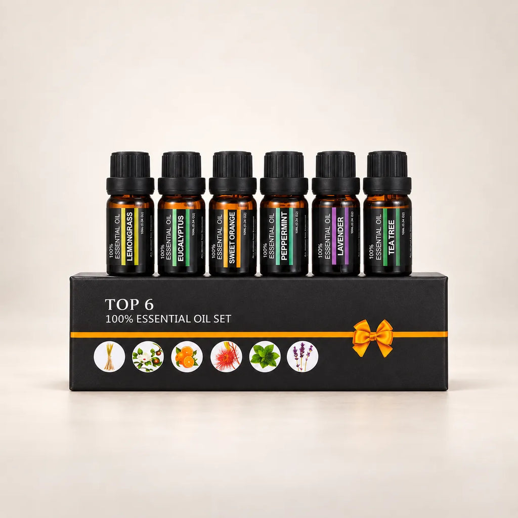 Six StillAura aromatherapy oil bottles displayed in a row beside their box.
