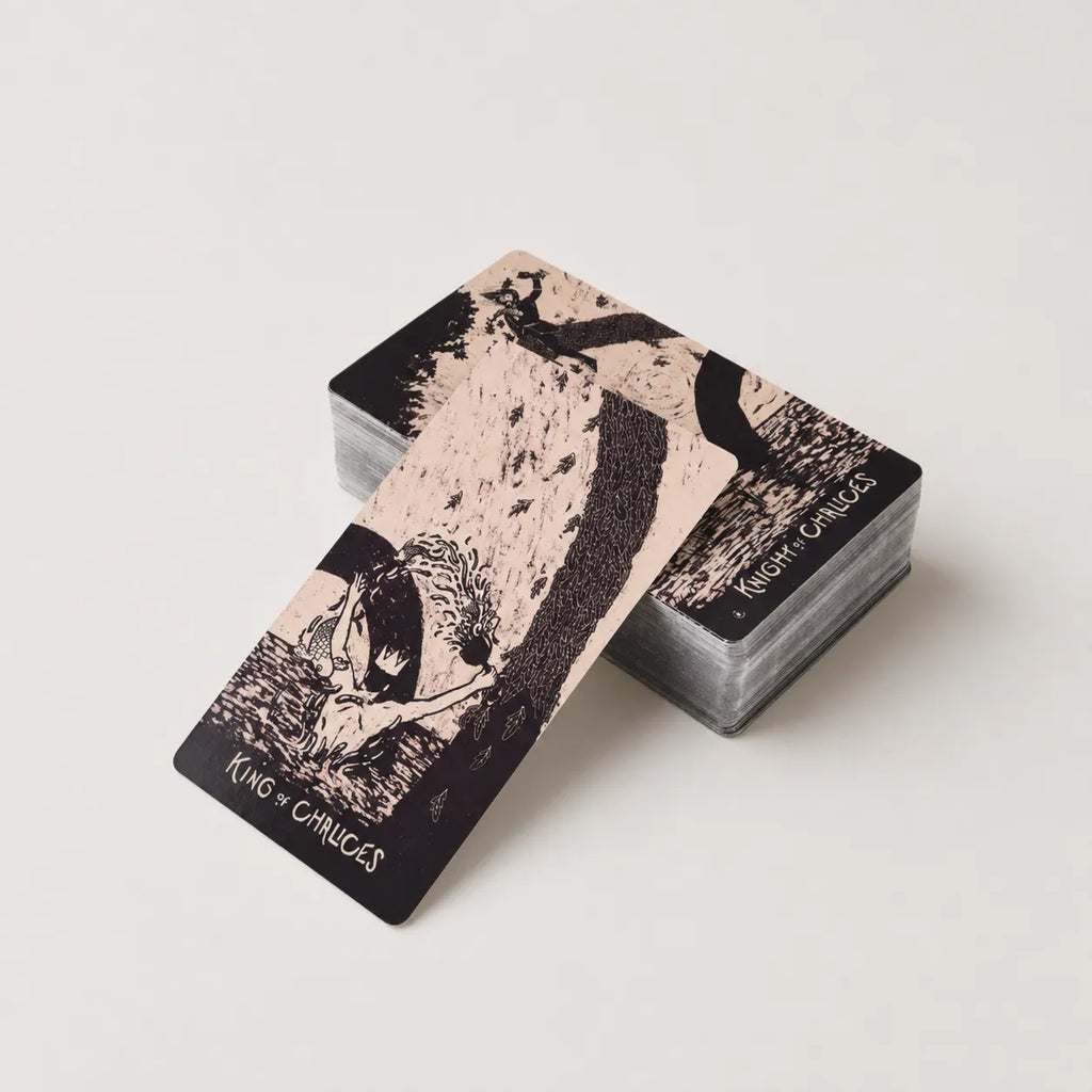 Moonveil Flare tarot cards, a 78-card English tarot deck for divination and family card reading, arranged face up.