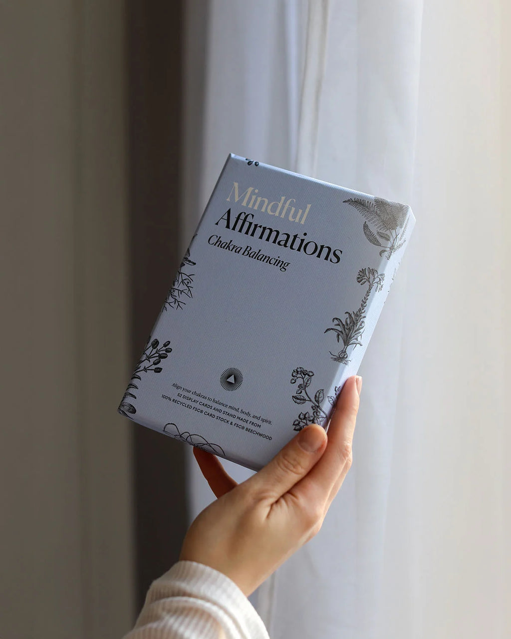 Chakra affirmation cards during a meditation practice