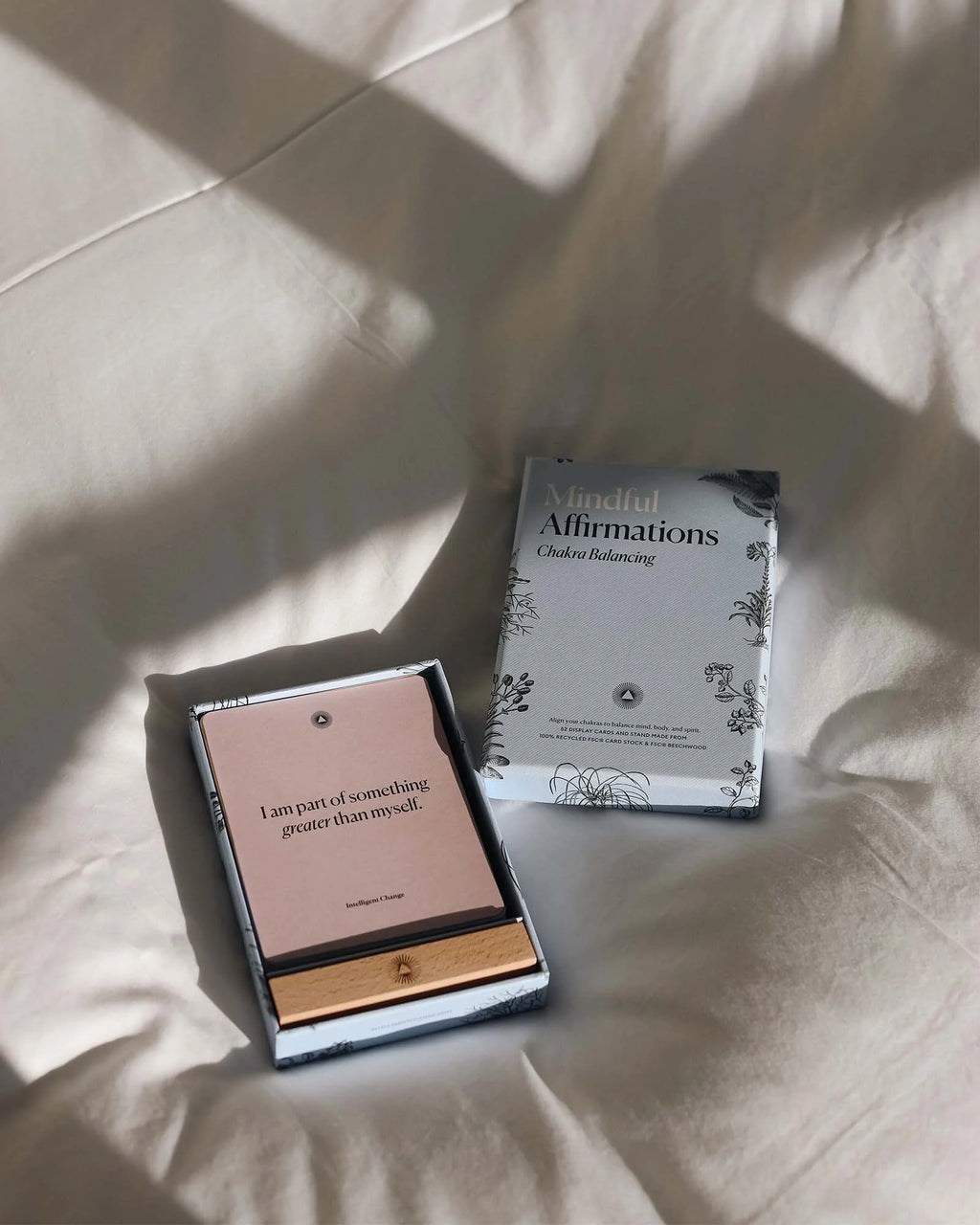 Chakra affirmation cards during a meditation practice