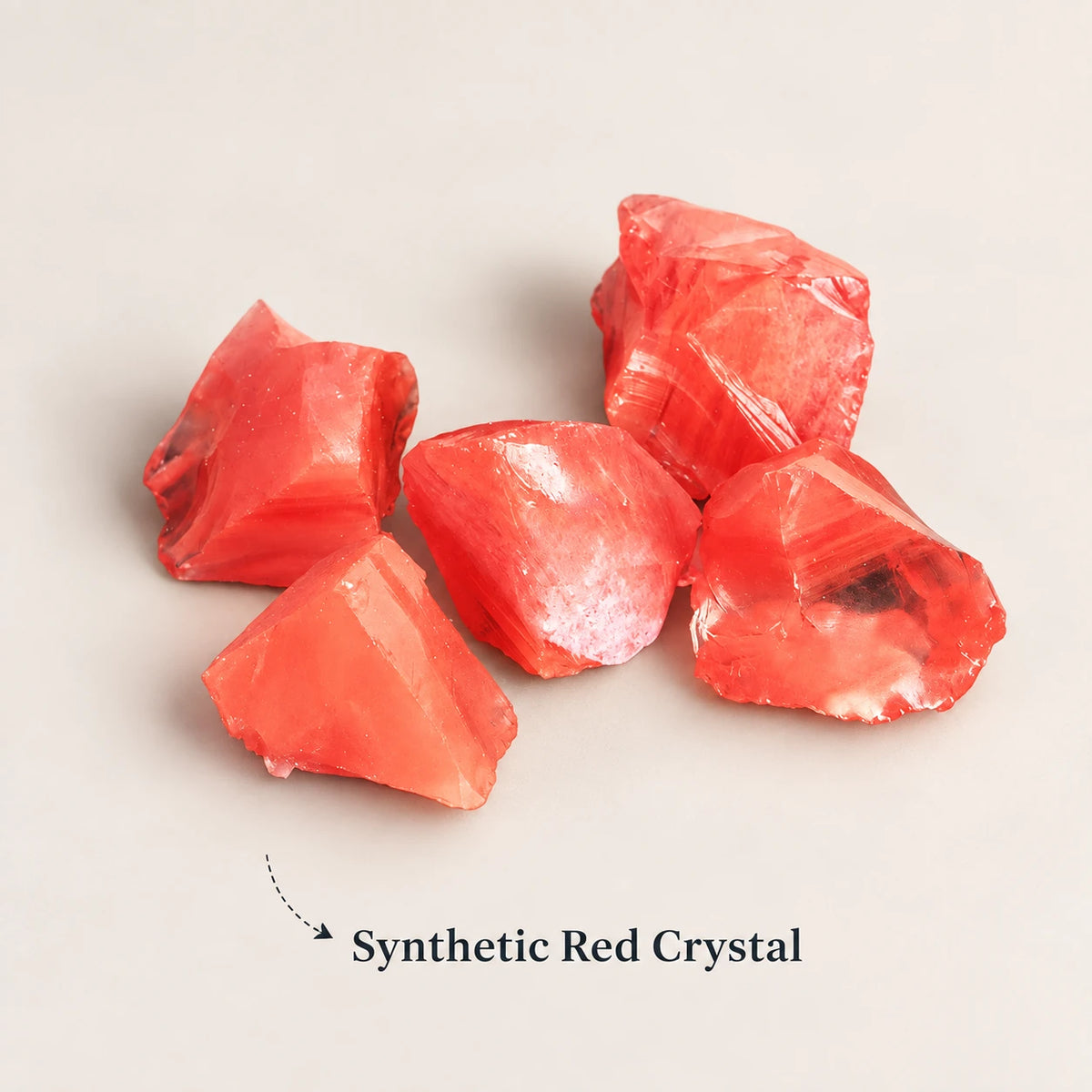 Synthetic red crystal rough diffuser stones.