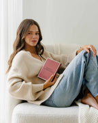 Woman holding Intelligent Change Mindful Affirmations for Women box