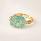 LumaStone green crystal ring with gold-toned wire wrapping
