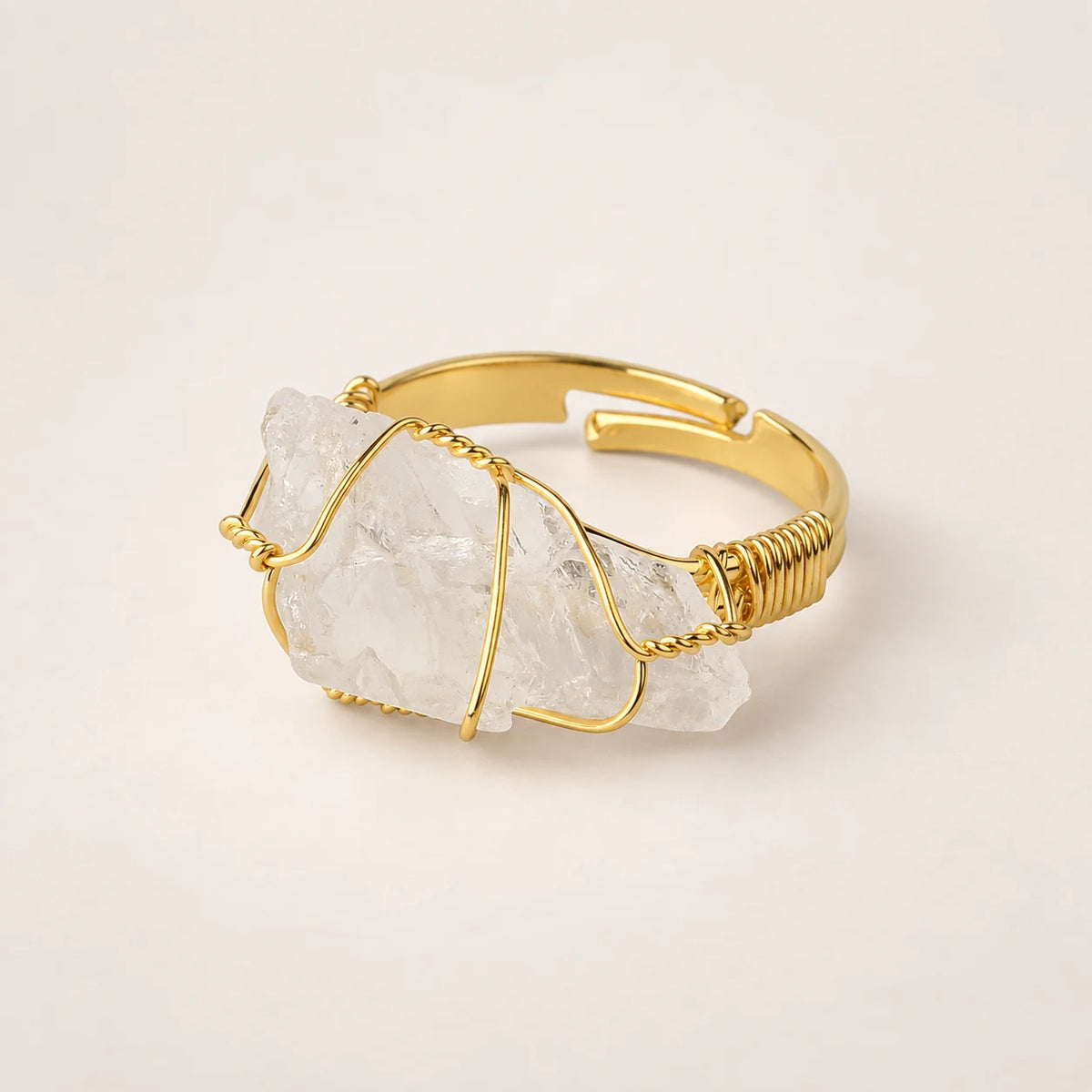 LumaStone white crystal ring with gold-toned wire wrapping