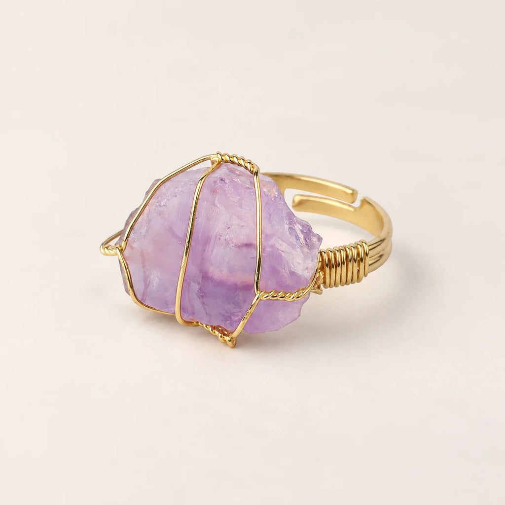 LumaStone purple crystal ring with gold-toned wire wrapping