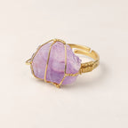 LumaStone purple crystal ring with gold-toned wire wrapping