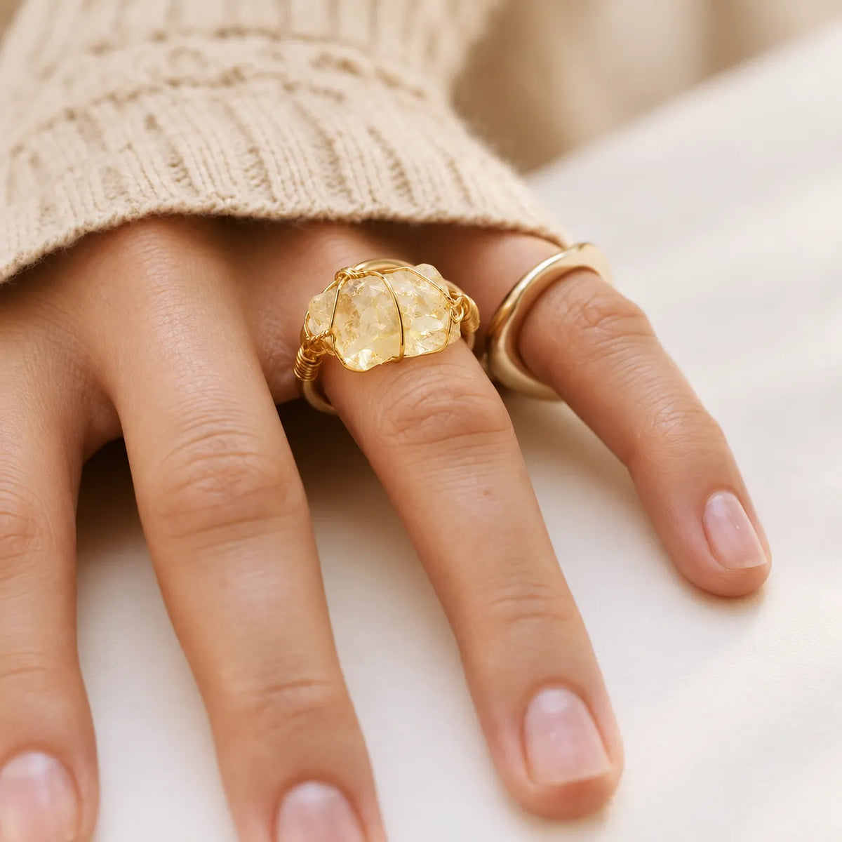 LumaStone white crystal ring with gold-toned wire wrapping