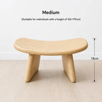 StillAura solid wood meditation bench, a Japanese style zen seating stool for mindfulness.