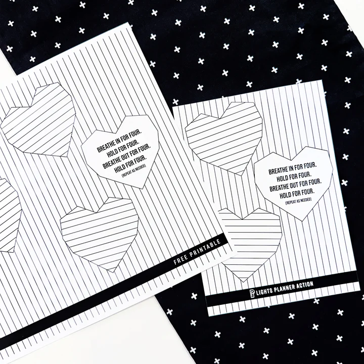 Two free printable heart-shaped breathwork guides with instructions for box breathing to help manage stress and improve mindfulness.